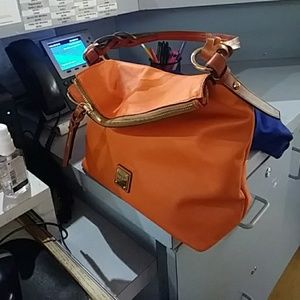 Dooney and bourke orange leather bag great conditi